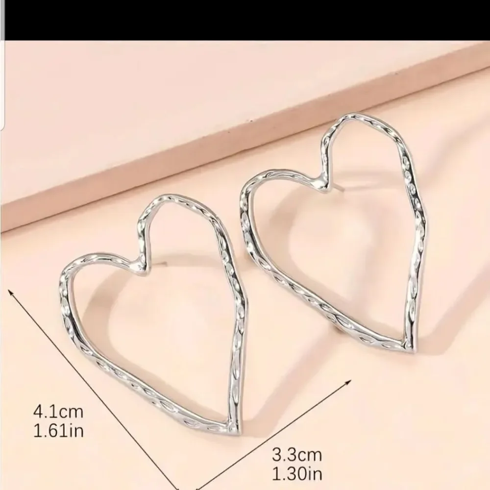 Heart silvertone stud earrings